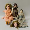 Three Bisque and Composition Dolls, a Bisque Doll Head, and a Trunk of Doll Clothing.