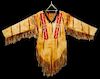 A Contemporary Beaded War Shirt, worn in The Last of the Mountain Men" 1976, 61 1/2 x 81 1/2 inches.
