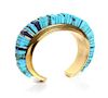A Hopi 18 Karat Yellow Gold, Turquoise and Lapis Bracelet, Charles Loloma (1921-1991) Length 5 1/2 x opening 1 x width 5/8 inche