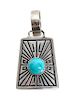 A Navajo Silver and Turquoise Pendant, Tommy Singer Height 2 1/4 inches.