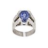 Gold ring with sapphire and diamonds.