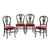 Four Napoleon III style chairs.