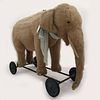 Vintage Steiff Large Elephant Pull Toy On Wheels, Circa pre-war, mohair body, glass eyes, ring pull growler to back, still functions well, mounted on 
