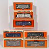 Group Of Seven Pieces Of Modern Lionel O Gauge Rolling Stock, All boxed, die cast three-rail including 6-17030 Milwaukee Road PS-2 2-Bay Hopper; 6-176