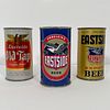 Three Eastside Flat Top Beer Cans, All 12oz cans including one for "Eastside Export Beer", metallic gold background with opening instructions and "Int