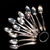 Twelve Sterling Teaspoons, and a Napkin Ring.