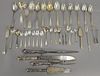 Sterling silver flatware with two large coin silver spoons. 31.06 t oz plus four large weighted handles.