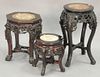 Three Chinese stands with inset marble. ht. 13 1/2in., 18 1/2in., & 24in.