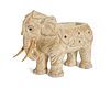 A carved wooden elephant planter