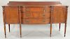Irving and Cassone A.H. Davenport mahogany Sheraton style sideboard. ht. 42in., wd. 72in., dp. 24in.