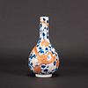 A IRON RED DECORATED BLUE AND WHITE 'DRAGON' VASE, QIANLONG MARK