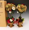 THREE CHRISTMAS ARTIFICIAL TOPIARY ARRANGEMENTS 