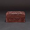 A CARVED SQUARE CINNABAR LACQUER BOX AND COVER 