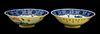 PAIR OF BLUE AND WHITE FAMILLE ROSE YELLOW-GROUND PORCELAIN CUPS