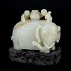 A FINE WHITE JADE RUSSET ELEPHANT AND BOYS GROUP