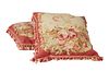 Pair of Aubusson Style Tapestry Pillows, 19th c., and later, with bright floral decoration and tasseled edges, H.- 19 in., W.-19 in.