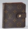 Louis Vuitton Compact PM Zip Wallet, in brown monogram coated canvas with golden brass hardware, the snap closure opening to a tonal lined interior wi