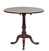 English Carved Mahogany Queen Anne Style Tilt Top Table. 19th c., the circular top on a turned tapered support to tripodal cabriole legs with pad feet