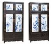 Pair of Unique Chinese Carved Zitan and Porcelain Wardrobes, 19th c., with double cabinet doors over double doors, all doors mounted with blue and whi