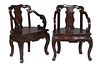 Pair of Chinese Export Lacquered Armchairs, late 19th c., the arched back and seat with incised figural and landscape decoration, flanked by serpentin