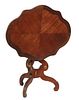 French Ormolu Mounted Louis XV Style Carved Rosewood Tilt Top Table, early 20th c., the oval serpentine top with an ormolu border, on tripodal ormolu 