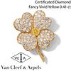 VAN CLEEF & ARPELS 'COSMOS' WHITE DIAMOND AND FANCY VIVID YELLOW DIAMOND FLOWER BROOCH