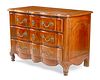 A French provincial serpentine commode