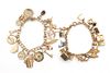 Two Whimsical Yellow Gold Charm Bracelets