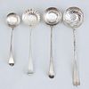THREE GEORGE III SILVER PUNCH LADLES AND A GEORGE III SILVER SAUCE LADLE