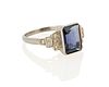 An iolite and diamond ring