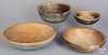 Four turned and painted wood bowls