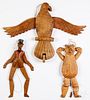 Three carved jumping jack toys