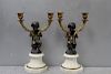 Pair of Patinated Bronze Putti Form Candlebra on