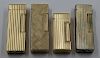 GOLD. Collection of 3 14kt Gold Dunhill Lighters.