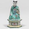 Small Chinese Glazed Porcelain Figure of an Immortal with Basket