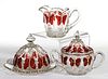 LATE BUTTERFLY - RUBY-STAINED THREE-PIECE TABLE SET