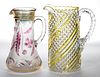ASSORTED EAPG - STAINED WATER PITCHERS, LOT OF TWO