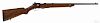 Winchester model 57 bolt action rifle, .22 caliber, clip fed, with a walnut stock, sling swivels