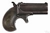 Remington Double Derringer, .41 rimfire caliber, with plastic grips and 3'' round barrels.
