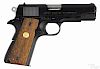 Colt Combat Commander semi-automatic pistol, 9 mm, with a 4'' round barrel. Serial #70BS53021.
