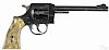 H & R Sidekick model 929 nine-shot revolver, .22 caliber, with tan plastic grips