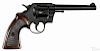 Colt Official Police six-shot revolver, .38 special caliber, with extended walnut target grips