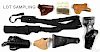 Miscellaneous holsters and web belts, to include two 1911 holsters, one dated 42, made by Boyt