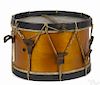 Civil War era snare drum with leather rope tighteners, a maple body, and heavily patinated bands