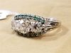 18K RING W/3DIAM. 1.80 CTS. SURROUNDING BY EMERALDS