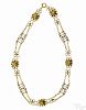14K yellow gold floral choker necklace, 14 1/2'' l., 16 dwt.