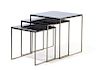 A Set of Modern Steel and Smoked Glass Nesting Tables Height of tallest 15 x width 15 x depth 15 inches