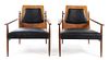 A Pair of American Mid-Century Elm and Leather Armchairs Height 31 1/2 inches
