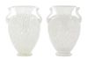 * Steuben, a pair of cluthra glass vases, each of baluster and handled form