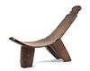 An African Carved Wood Lounge Chair Height 35 inches x depth 48 inches